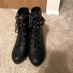 Black heeled ankle boots.